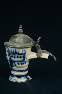 Neck of stoneware jug, tin valve cover, under pouring mask, ear piece, jug crockery holder fragment soil find tin ceramics
