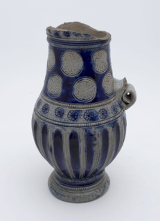 Slender stoneware jug with rosettes on the neck, wide flutes on the belly, ear, jug crockery holder soil find ceramic stoneware