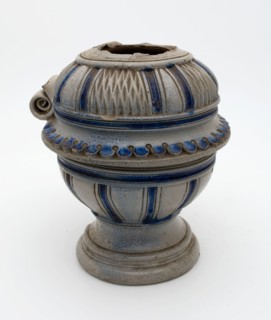 Stoneware jug be cut on the shoulder with ribs on the carve, protruding ridge over the belly, ribs underneath, jug crockery