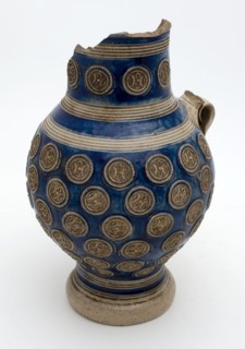 Stoneware jug have gray rosettes on the neck and belly, shoulder with two gray bands, jug crockery holder soil find ceramic