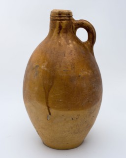 Light brown jug with band ear and tail, jug crockery holder soil find ceramic stoneware glaze salt glaze, hand turned fried