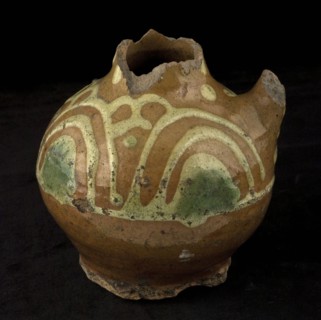 Fragment of earthenware oil jug, on stand with standing ear and sludge decoration, oil jug crockery holder soil find ceramic