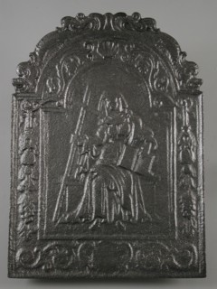 Fireback woman with cross and book, Fides, hob plate cast iron, cast Rectangular bow at the top on which two dolphins.