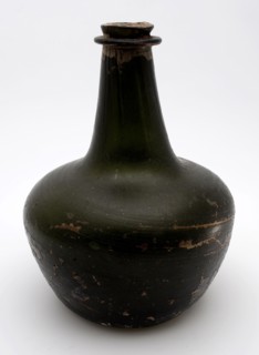 Belly bottle, 'shaft and globe', bottle holder bottomfound glass, free blown and shaped glass application Bulky bottle