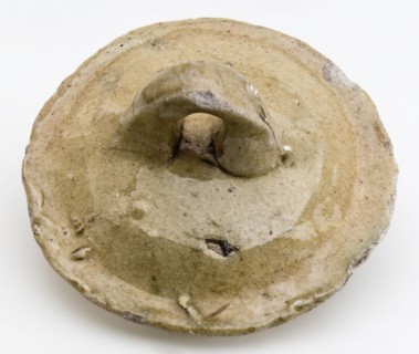 Earthenware lid, yellow glazed with horizontally placed ear, lid closure component earth discovery ceramics earthenware glaze