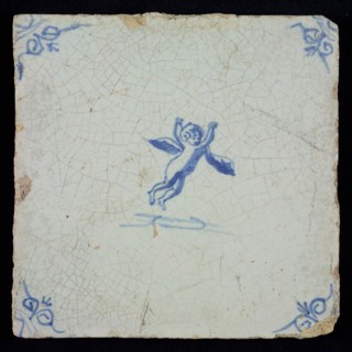 White tile with blue cupid; corner pattern ox head, wall tile tile sculpture ceramic earthenware glaze, baked 2x glazed painted