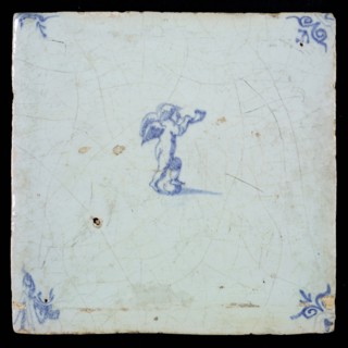 White tile with blue putto with wind instrument; corner pattern ox head, wall tile tile sculpture ceramic earthenware glaze
