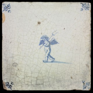 White tile with blue putto; corner pattern ox head, wall tile tile sculpture ceramic earthenware glaze, baked 2x glazed painted