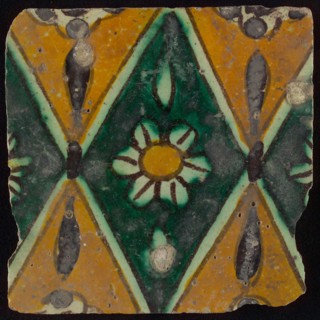 Floor tile, brown draft, green and yellow on white ground, central green oblique glass in which white flower with yellow heart