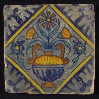 Tile, orange, brown, green and blue on white, flowerpot in square, corner pattern palmet, wall tile tile sculpture ceramic