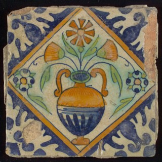 Tile, orange, brown, green and blue on white, flowerpot in square, corner pattern palmet, wall tile tile sculpture ceramic