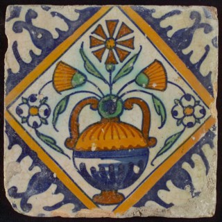Tile, orange, brown, green and blue on white, flowerpot in square, corner pattern palmet, wall tile tile sculpture ceramic