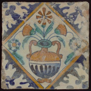 Tile, orange, brown, green, and blue on white, flowerpot in square, corner pattern palmet, wall tile tile sculpture ceramic