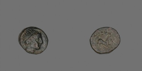Coin Depicting the God Apollo (?), 336/323 BC, Greek, Greece, Bronze, Diam. 1.7 cm, 4.15 g