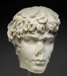 Fragment of a Portrait Head of Antinous, Mid–2nd century AD, Roman, Italy, Marble, 31.7 × 31 × 17