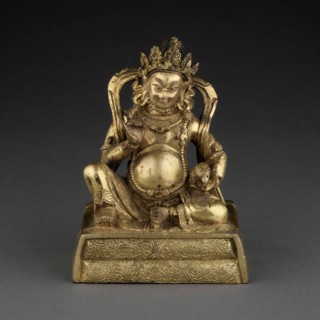 Yaksha General Holding a Mongoose, 18th century, Tibet, Tibet, Gilt copper, 9.8 x 7.4 x 5.5 cm (3