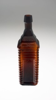 Bottle, c. 1840/50, Bohemia, Czech Republic, Bohemia, Amber glass, 25.4 × 7.6 × 7.6 cm (10 × 3 × 3