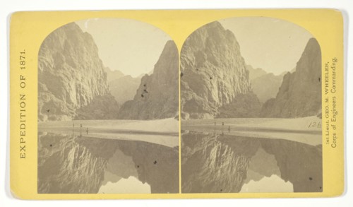 View down Black Cañon, from Mirror Bar. The walls repeated by reflection, 1871, Timothy O’Sullivan