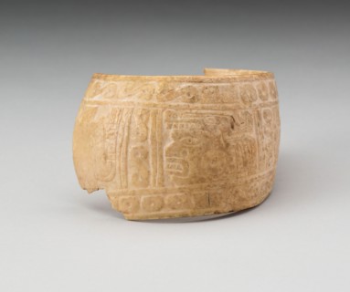 Shell, Possibly an Arm Band, Incised with Profile Head Framed by Geometric Motifs (Frament), c. A.D