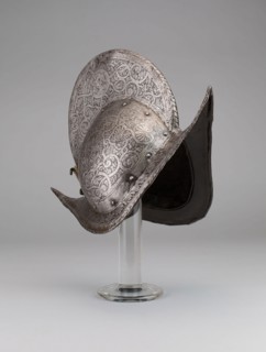 Comb Morion, 1570, French, France, Steel, iron, brass, and leather, 24.1 × 40.6 × 35.6 cm (9 1/2 ×