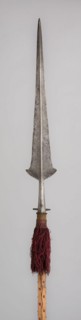 Partisan, c. 1520, Italian, Italy, Steel, wood (pine), iron, velvet, and tassel, Blade with socket