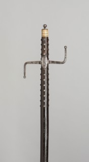 Walking Staff with Sword Hilt, 1663, German, Germany, Wood, iron, and bone, L. 119.4 cm (47 in.)