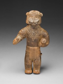 Masked Figurine Holding a Drum, Possibly a Ocarina (Whistle), c. A.D. 1300, Tairona, Sierra Nevada