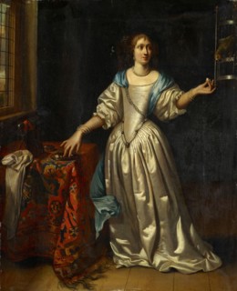 Lady with parrot, oil on oak wood, 40 x 32.2 cm, On the windowsill left an illegible signature.,