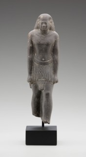 Egyptian, Statue of the Priest, Pa-ef-tchau-em-awy-Bastet, 595/589 BC, basalt, 9 1/4 x 2 3/4 x 2