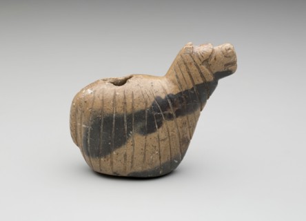 Inca, Precolumbian, Conopa, between 15th and 16th century, carved beige stone with black veining,