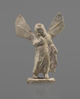 Terracotta figurine of Psyche, Young Psyche with butterfly wings, wrapped in a chlamys. Right hand