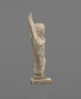 Terracotta figurine of Psyche. Young Psyche with butterfly wings, wrapped in a chlamys. Right hand