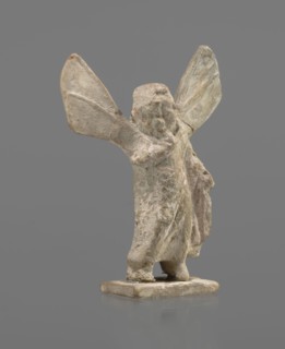 Terracotta figurine of Psyche, Young Psyche with butterfly wings, wrapped in a chlamys. Right hand