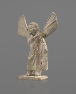 Terracotta figurine of Psyche, Young Psyche with butterfly wings, wrapped in a chlamys. Right hand