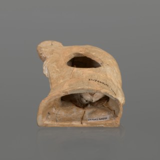 Terracotta figurine of a youth with a terracotta mask;, Hellenistic period, ca. 4th–3rd century BC