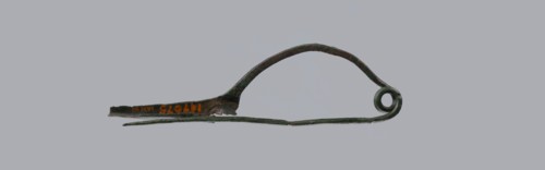 Arched fibula, Goluchów Greater Poland Voivodeship. Fibula with an arched bow. The pin emerges from