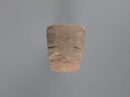 Pyramidal clay seal with a roughly square stamp surface and rounded corners. Shallow incisions at