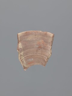 Fragment of a conical bowl or possibly a large funnel, tabletop or kitchen vessel. Made in an
