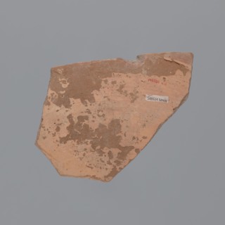 Fragment of a large plate or platter of Egyptian Red Slip Ware B type. Vessel made of Nile clay