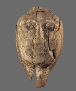 Sarcophagus mask with a preserved fragment of the neck and a protrusion above the forehead an