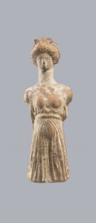 Terracotta figurine of a woman, terracotta, female molded figurine, Greece, orange clay, surface