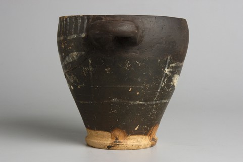 Black-finished skyphos with painted decoration on the finis, white decoration: A = B - laurel