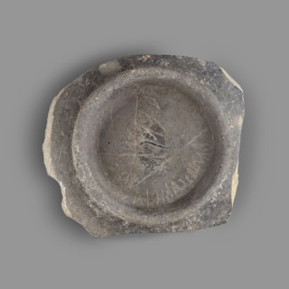 Fragment of a bucchero nero bowl. Bucchero nero; ancient Etruscan vessel, 6th–5th century BC