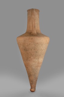 Transport amphora, slightly sloping shoulders. High and narrow neck, narrowing at the top and