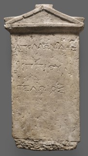 Tombstone of Apollonides with Greek inscription. Rectangular slab with three lines of Greek