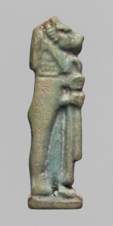 Amulet of Hapi. Relief figurine of Hapi — one of the Sons of Horus. Hapi shown in right profile