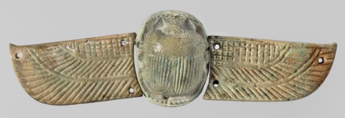 Winged scarab. Winged scarab with a realistically modeled torso, head, and legs. On the