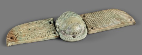 Winged scarab, Winged scarab with a realistically modeled torso, head, and legs. On the