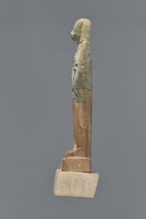 Fragment of a shabti. Mummy-shaped figurine, grave good, preserved to the beginning of the thighs.
