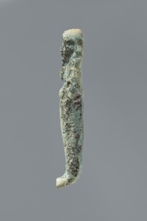 Ushabti, mummy-shaped figurine. Flat back. Arms crossed on the chest, only the hands protruding